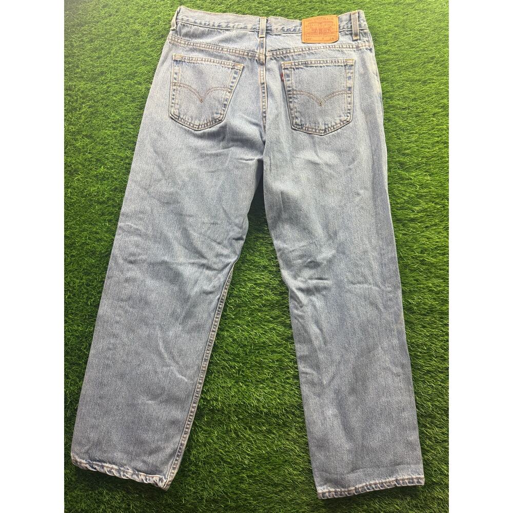 Vtg Levi’s 577 Lower Rise Loose Fit Jeans Women's 14 USA Light Wash 100% Cotton - Picture 5 of 15